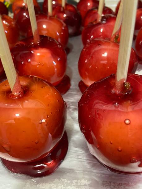 istock Close up of red candy apples. 1350602729