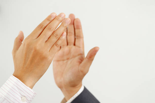 istock business people shaking hands congratulating sales 1350604657