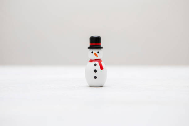 Wooden skittles in the shape of snowmen - part of a series - can be used as a rating
