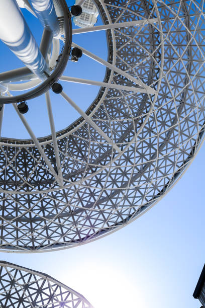 istock Steel structures on Bluewaters island Dubai against the sun amd blue sky 1350608935