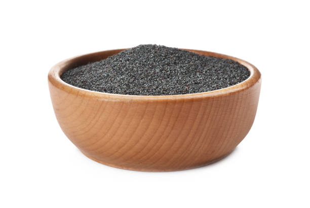 istock Poppy seeds in bowl isolated on white 1350609011