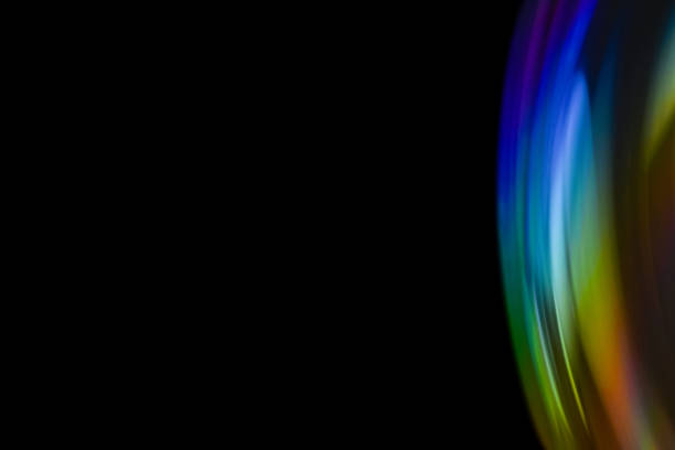 istock Closeup soap bubble like reflection from lens on dark background. Abstract multicolor psychedelic alien planet 1350612089