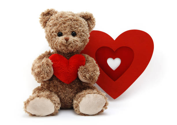 istock teddy bear with red heart isolated on white background 1350612678