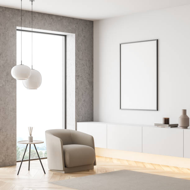 istock Bright living room interior with white empty poster, panoramic window 1350617628