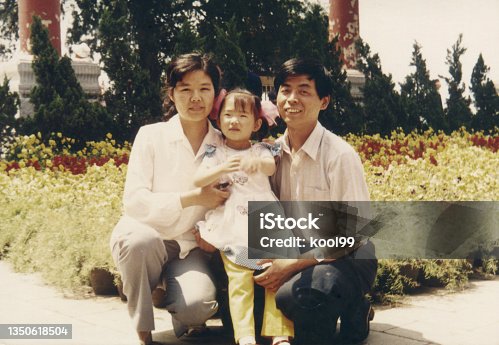 istock 1980s China Parents and daughter old photos of real life 1350618504