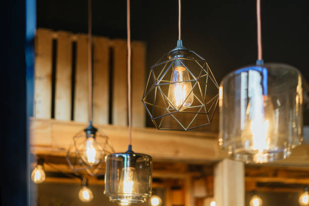 istock Illuminated bulbs in a flower shop. 1350618995