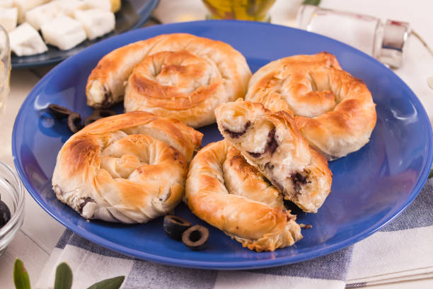 istock Pastry swirls with cheese and olive filling. 1350621950