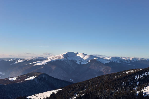 istock Winter landscape in snowy mountaines 1350626589