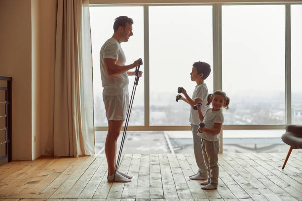 istock All family doing workout toggether at home 1350626934