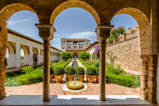 istock Generalife palace with green courtyard in Alhambra, Granada, Spain 1350628231