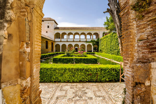 istock Generalife palace with green courtyard in Alhambra, Granada, Spain 1350628260