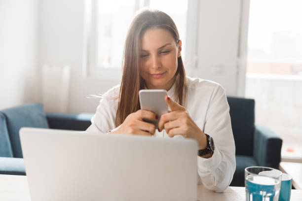 istock Young Caucasian woman working from home 1350628313
