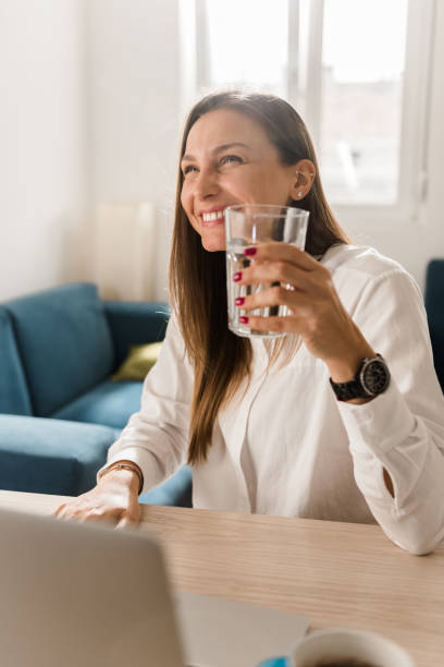 istock Young Caucasian woman working from home 1350628388