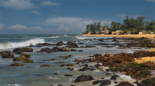 West Africa. Senegal. Rocky-sandy beach of the resort town of Ngaparou on the Atlantic Ocean.