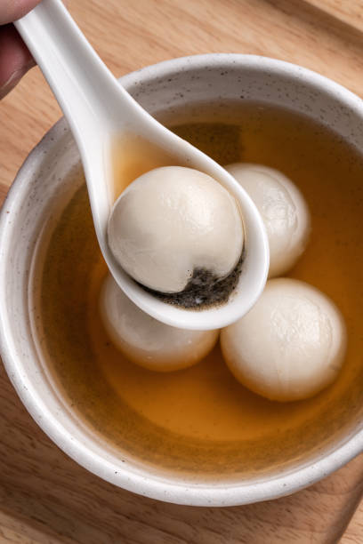 istock Sesame big tangyuan with syrup soup. 1350628765