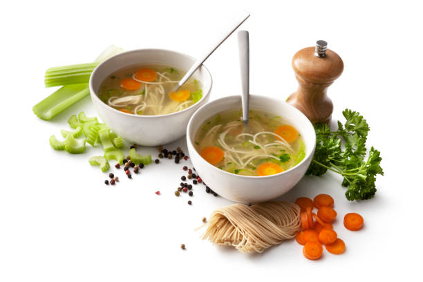 istock Soups: Chicken Soup and Ingredients Isolated on White Background 1350628940