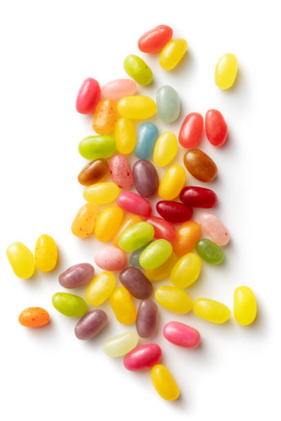 Candy: Jellybeans Isolated on White Background Candy: Jellybeans Isolated on White Background pick and mix stock pictures, royalty-free photos & images