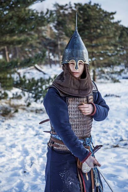 istock Viking warrior in a snow filled forest 1350634911