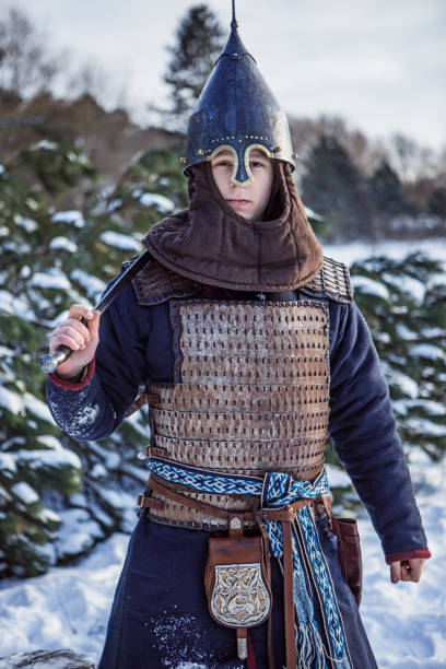 istock Viking warrior in a snow filled forest 1350634912