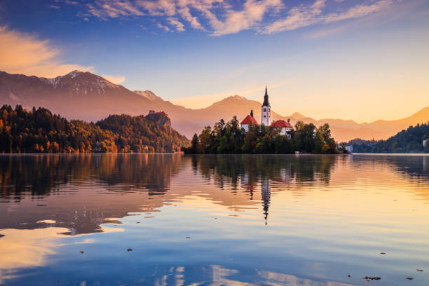 Lake Bled, Slovenia. Lake Bled, Slovenia. Sunrise at Lake Bled with famous Bled Island and historic Bled Castle in the background. gorenjska stock pictures, royalty-free photos & images