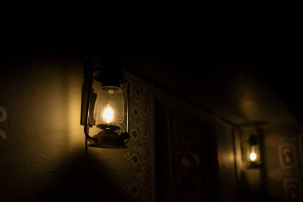 Traditional Mud House Interior design with Kerosene Lantern ambience lighting very nice looking stock photo