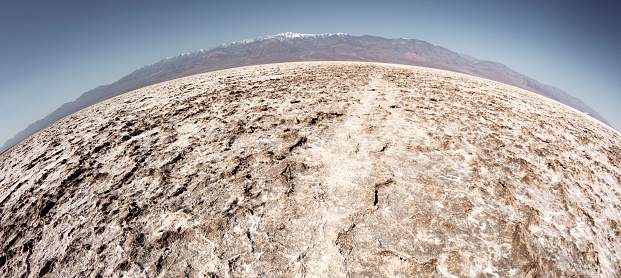 Death Valley in California seen with a fisheye lens. Curve horizon simulating the shape of the Earth: good concept for arid climate and global warming.