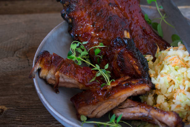 istock Barbecue ribs with coleslaw on a plate 1350638045