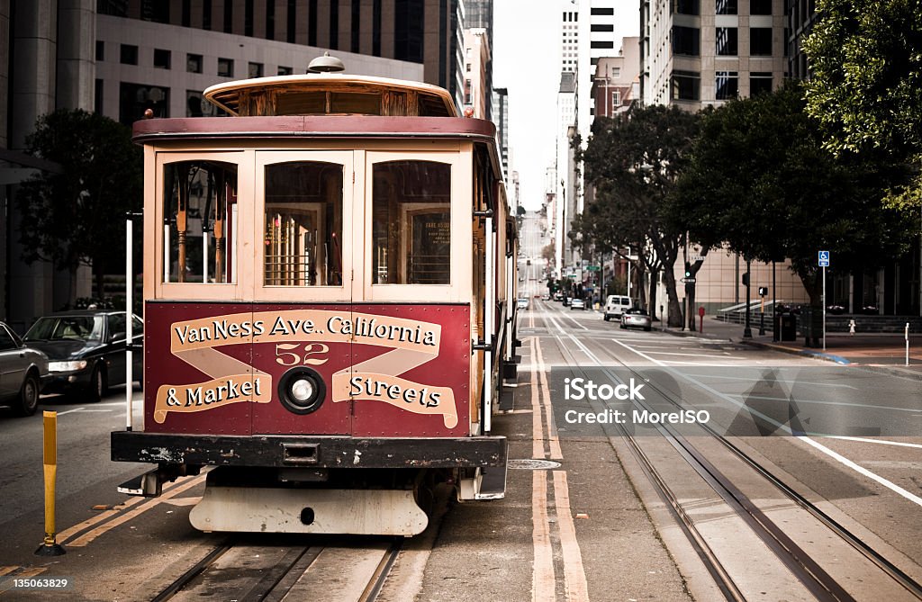 A red and gold street cable car in San Francisco California Famous cable car of San Francisco. More images from San Francisco in the lightbox: Cable Car Stock Photo