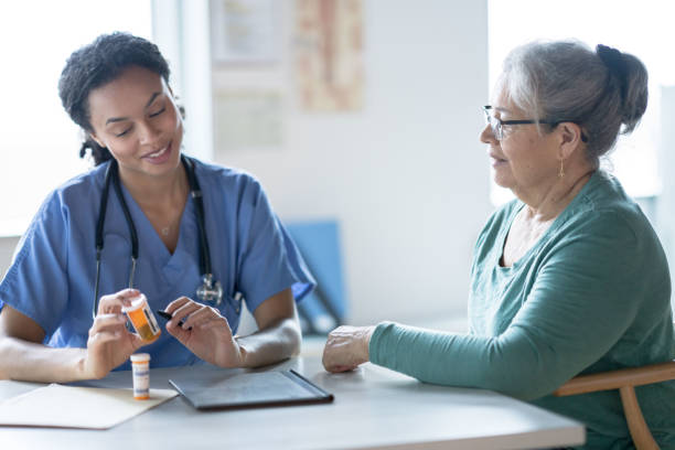 istock Nurse Reviewing how to Safely Take a Patients Medication 1350643541