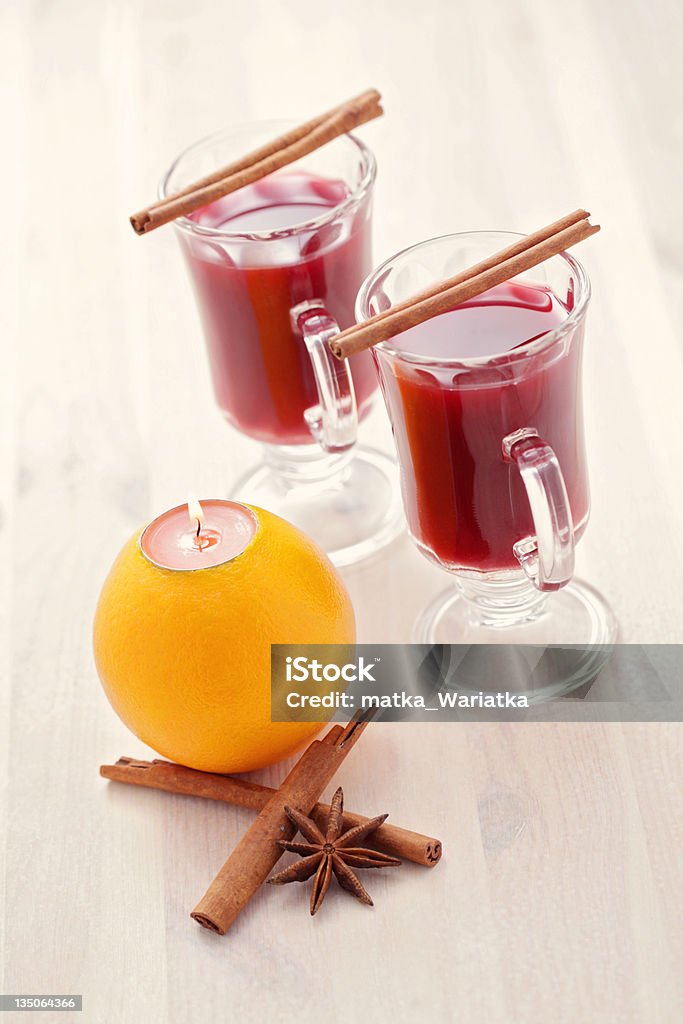 mulled wine hot wine with spices and orange - food and drink Candle Stock Photo