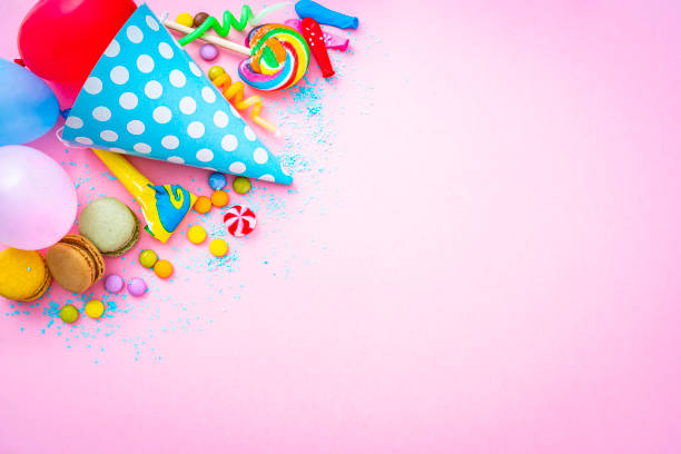 istock Pink background with party or birthday items 1350648473