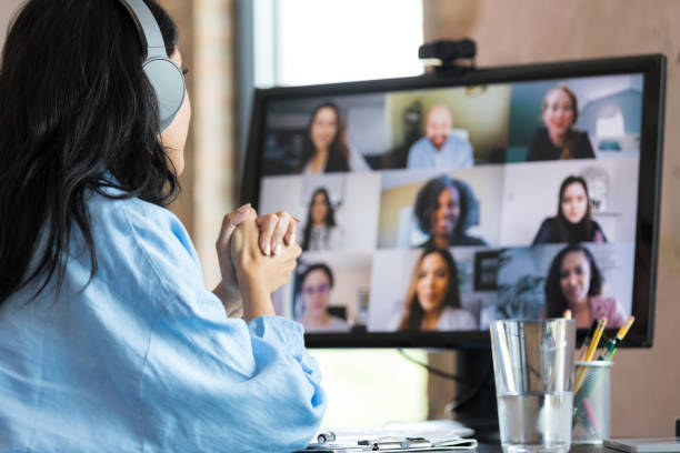 istock Multi-ethnic group attends virtual employee engagement meeting 1350649368