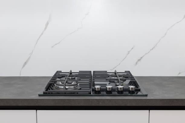 istock kitchen gas stove on gray worktop and white marble backsplash 1350649797