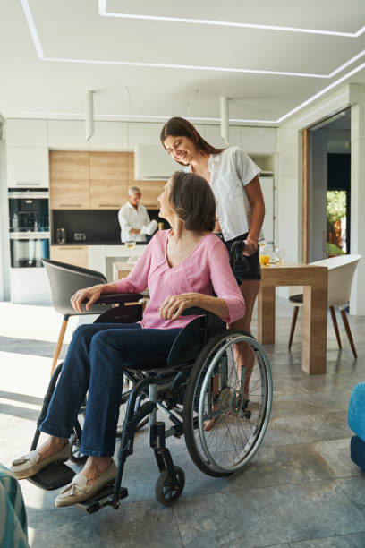 istock Relatives spending time together and talking at home 1350652852