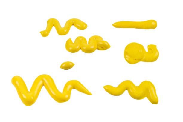 istock Yellow cheese sauce splashes isolated on white background. 1350653643
