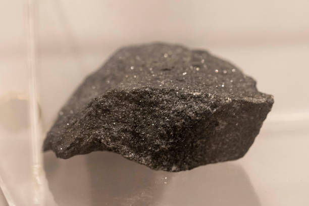 istock Magnetite black collection stone on display (selective focus). 1350654137