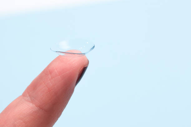 istock contact lenses on the finger on blue background 1350654989