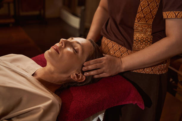 istock Placid lady patient dozing during acupressure therapy session 1350660457