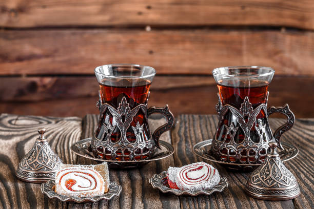 istock Fragrant Turkish tea and Turkish sweets in national dishes 1350661187