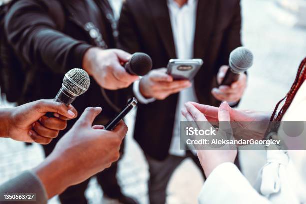 Female Leading Interview With Journalists Outside Stock Photo - Download Image Now - Journalism, Journalist, Press Conference