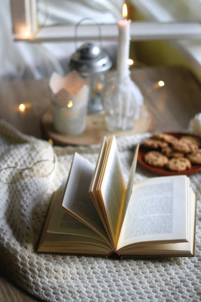istock Cookies, Cinnamon, Book and Candles 1350666391