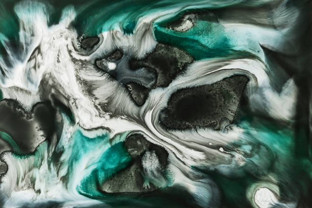 istock Green color alcohol ink background, abstract ocean. Exoplanet surface, marble texture, fluid liquid background. Stains and streaks of paint under water 1350666808