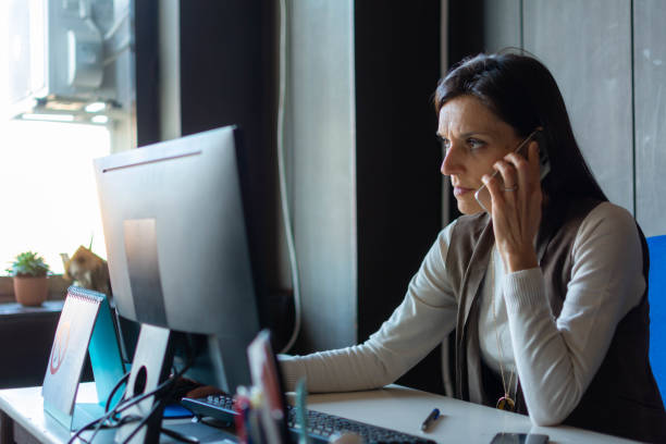 istock Businesswoman on phone talking to client 1350671190