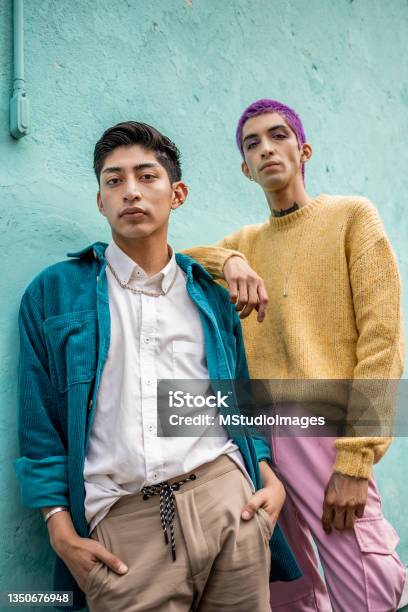 Low Angle Photo Of Two Young Man Stock Photo - Download Image Now - Fashion, Generation Z, LGBTQIA People