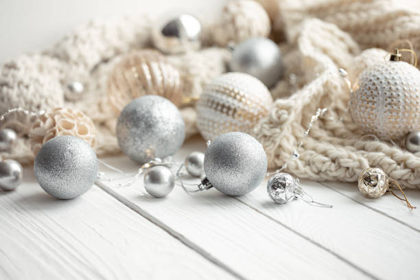istock Christmas festive background with Christmas balls and knitted element. 1350677289