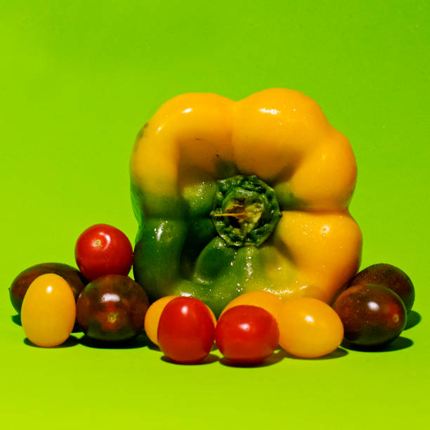 istock Yellow pepper with little tomatoes 1350683330
