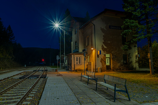 Railway station in Ostruzna village in Jeseniky mountains in autumn night
