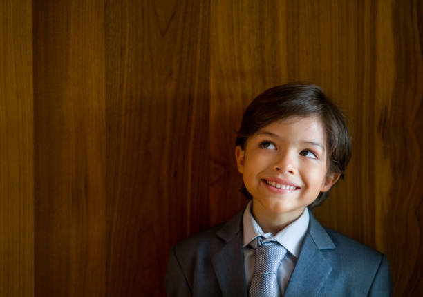 istock Young business man looking thoughtful 1350686038