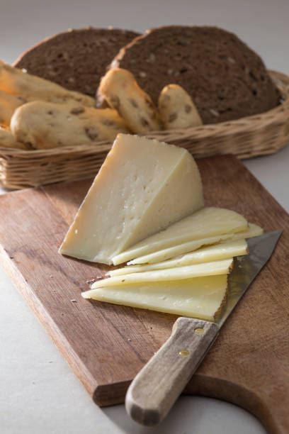 istock sliced cheese and basket of various rolls 1350689190