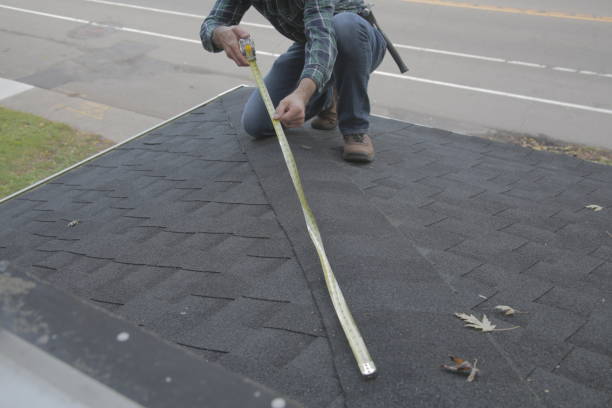 istock Roofer measuring roof wide 1350689266